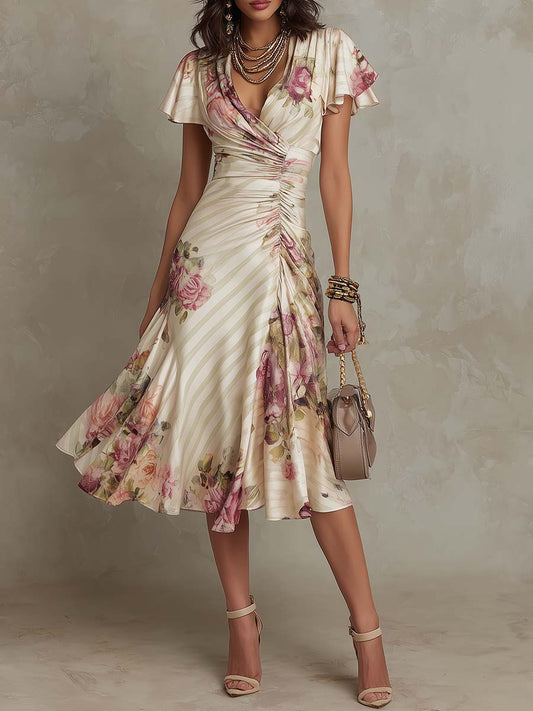 Alba | Elegante vestido midi cruzado con fruncido y estampado floral