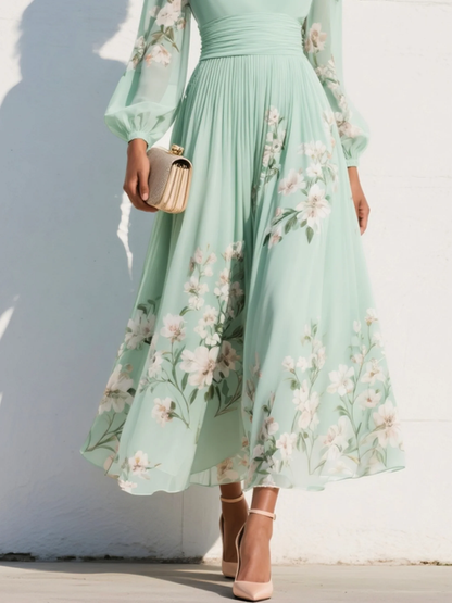 Vestido largo plisado de gasa en verde menta con estampado floral para mujer.