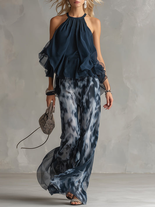 Ludovica | Elegante conjunto estampado de top halter azul marino y perneras anchas